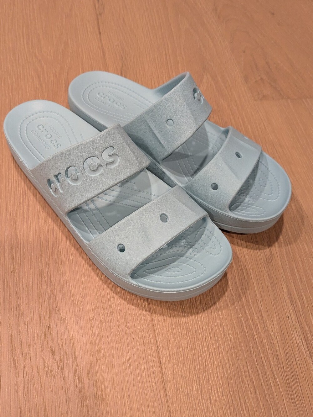 Crocs Slide Sandals in Light Blue